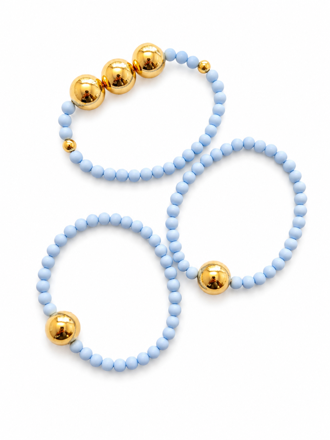 Light blue and gold bracelet stack