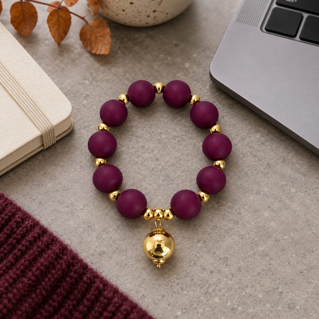 Burgundy silicone beaded bracelet with gold drop