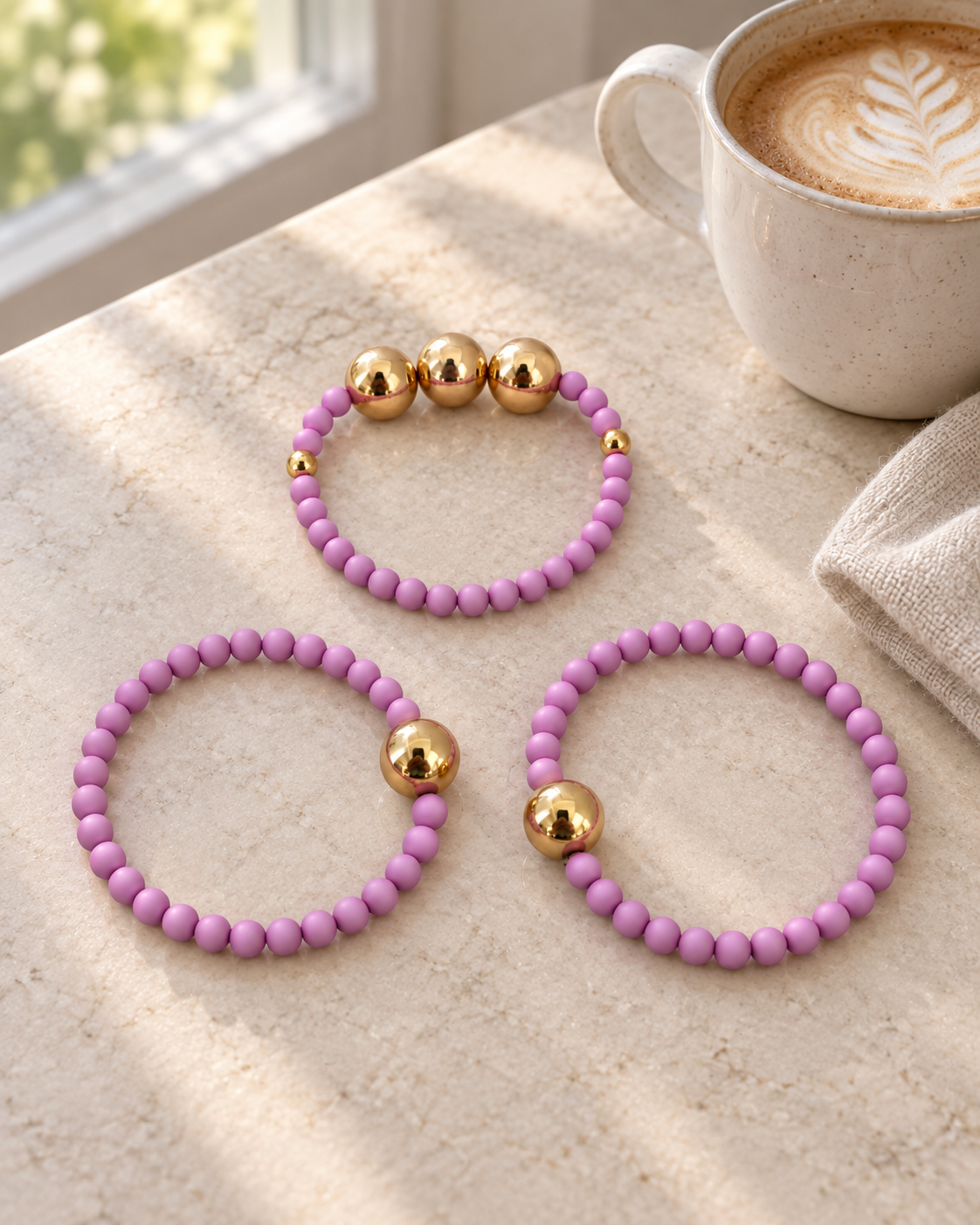 Purple and rose gold beaded bracelet stack
