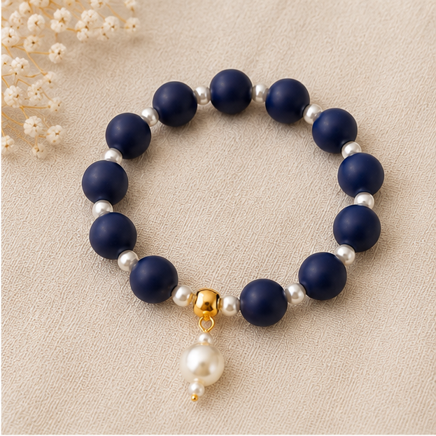 Navy silicone beaded bracelet with pearl spacers and a navy drop bead