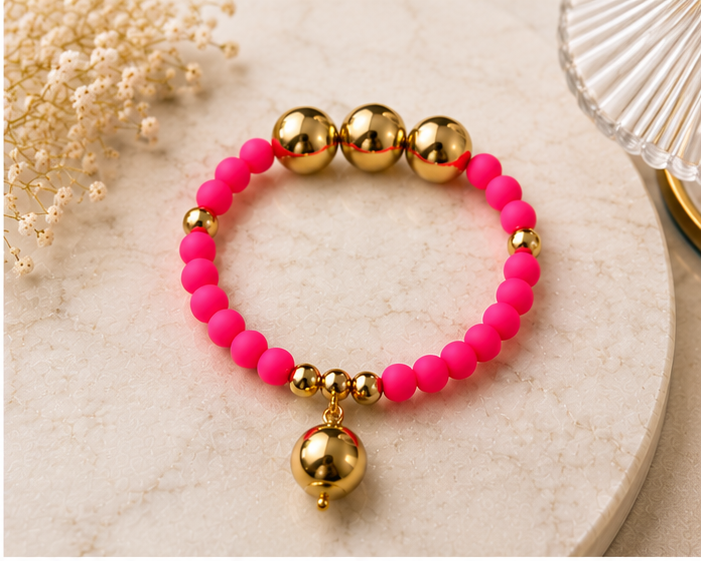 Bright Pink and gold beaded bracelet