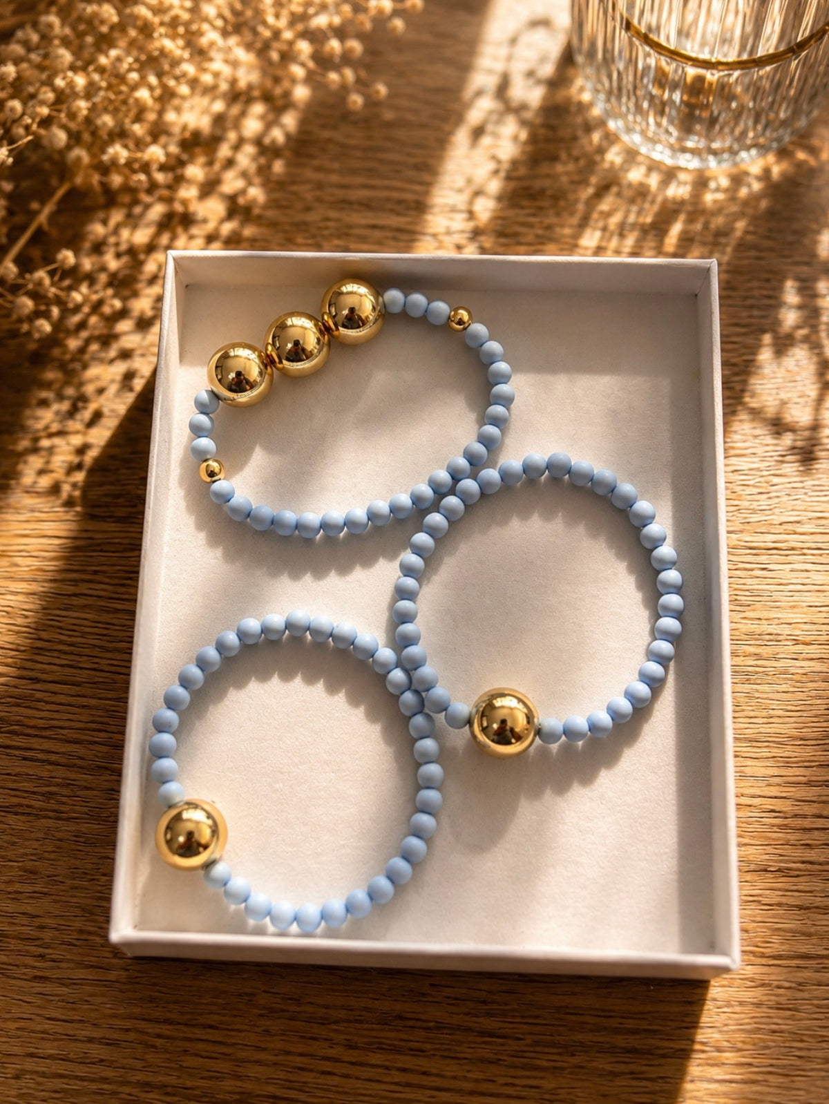 Light blue and gold bracelet stack