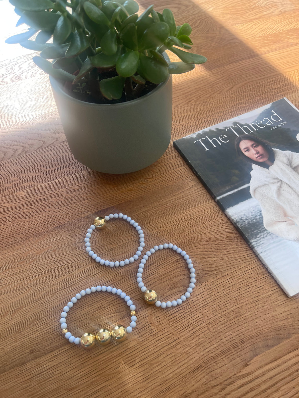 Light blue and gold bracelet stack