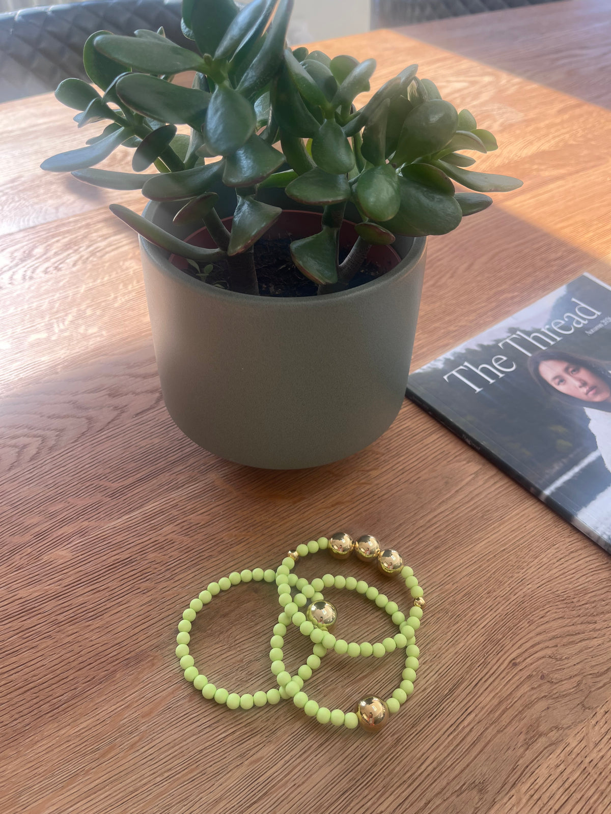 Light lime green and gold bracelet stack
